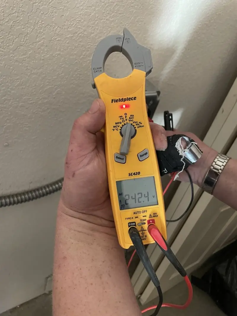 Voltage testing with clamp meter during Aluminum Wiring Replacement in Leighton